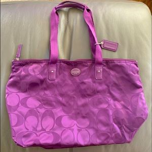 Purple Coach signature tote bag